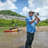 Man Fishing the Tug